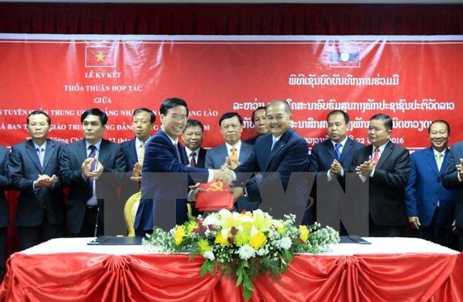 Đoàn đại biểu cấp cao Ban Tuyên giáo Trung ương Đảng Cộng sản Việt Nam thăm và làm việc tại Lào  - ảnh 1